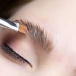 close-up of the procedure for long-term eyebrow styling, the master performs eyebrow lamination