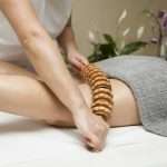 Maderotherapy anti-cellulite massage with wooden roller massager