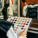 Woman deciding hair colour shade in salon